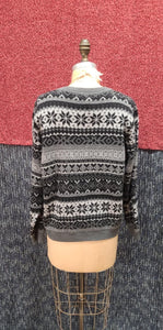 Cardigan noir et gris à motifs hivernaux